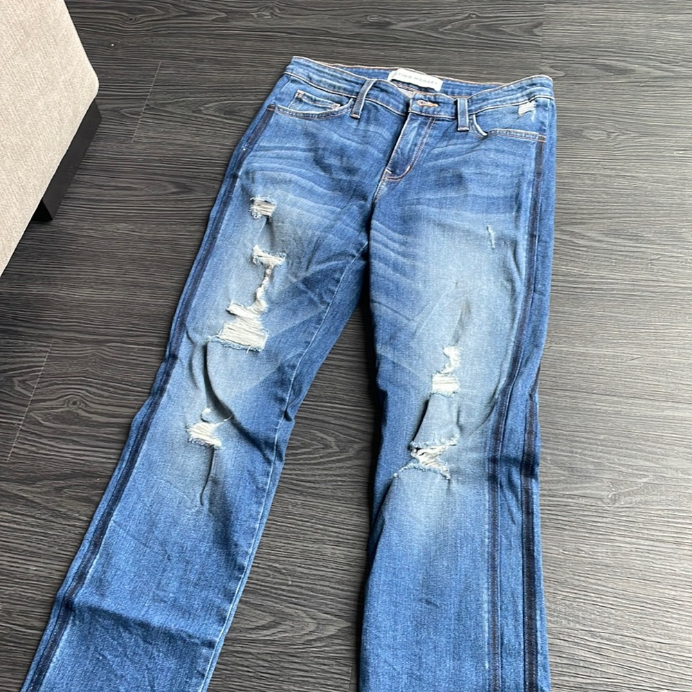 Flying monkey ripped blue jeans. Flared leg